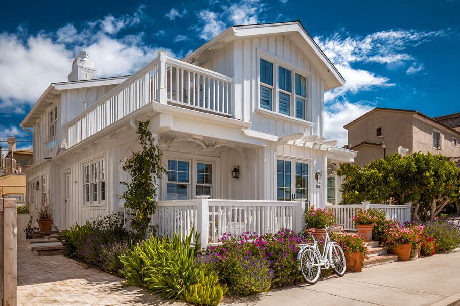 Beachside home exterior featuring Huntington Beach CA windows and classic coastal design