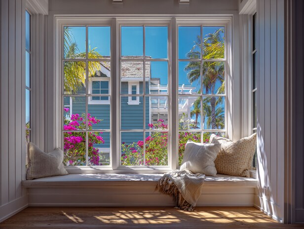 Interior window with mullions and natural light highlighting style and structure of Huntington Beach, CA windows